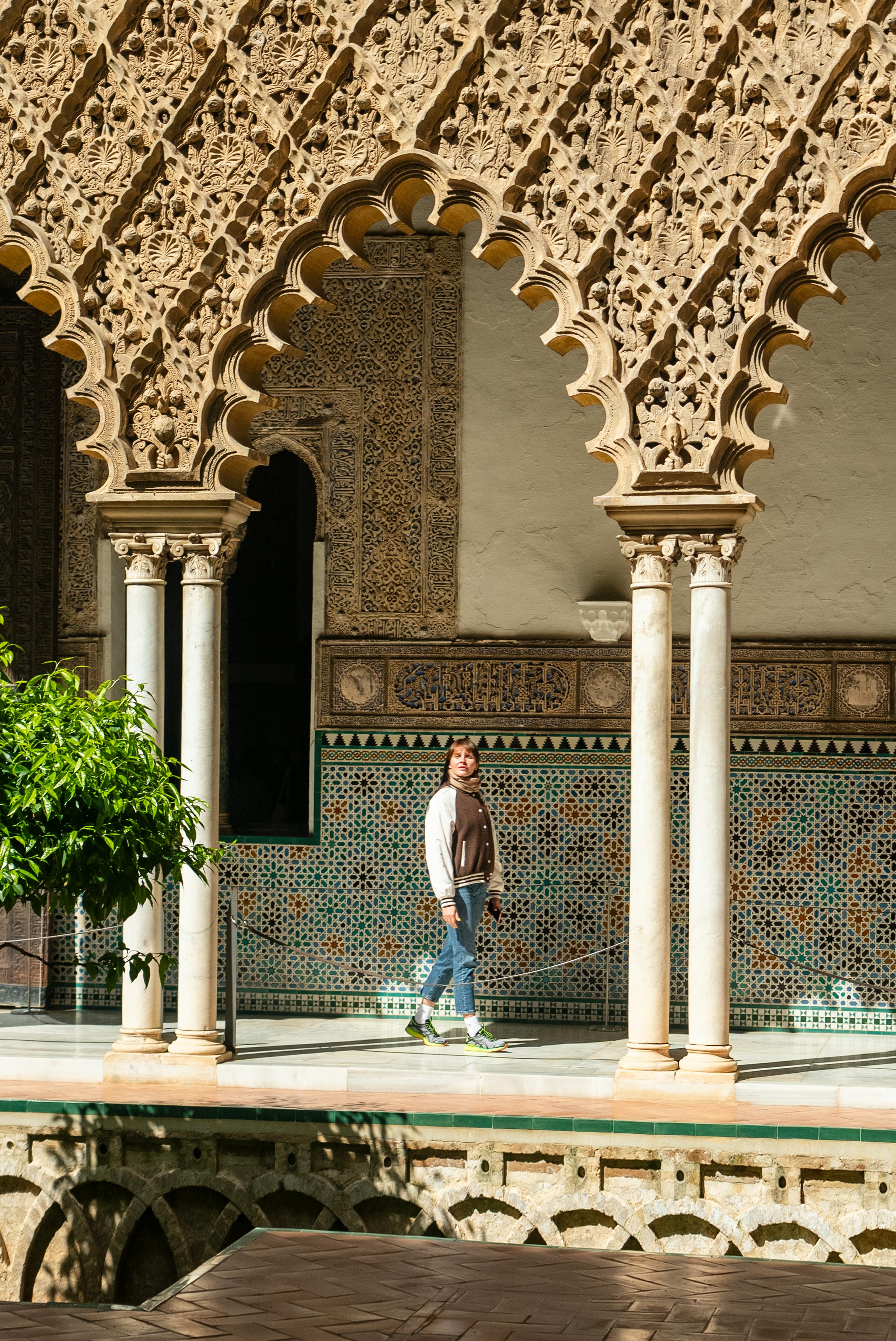 man in a traditional palace in seville