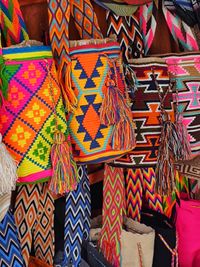 Woven market bags on display — photo by Sonia Motta on Pexels