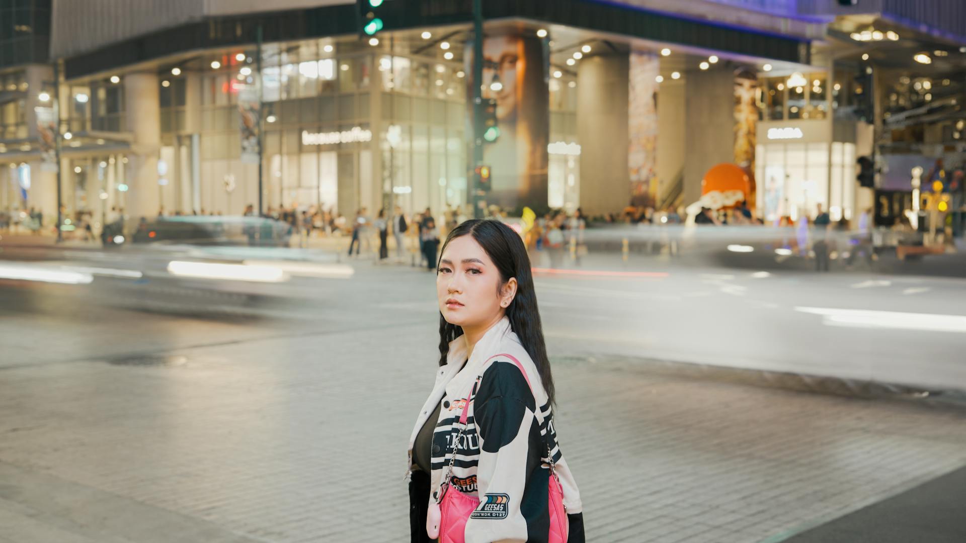 Woman Standing on Square by Shopping Mall