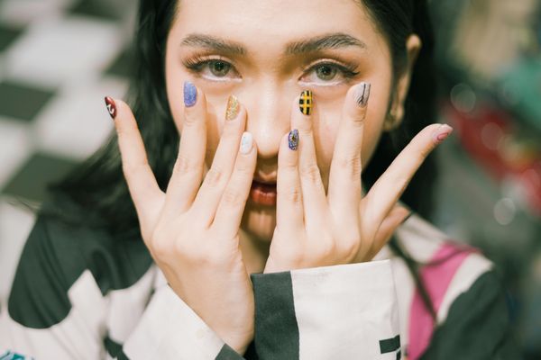 Mismatched pastel tip nail design