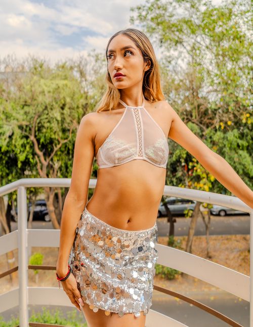 Free Woman in sequined outfit posing on a balcony in Ciudad de México. Stock Photo