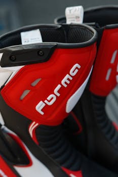 Detailed close-up of red Forma motorcycle boots, showcasing design and craftsmanship.