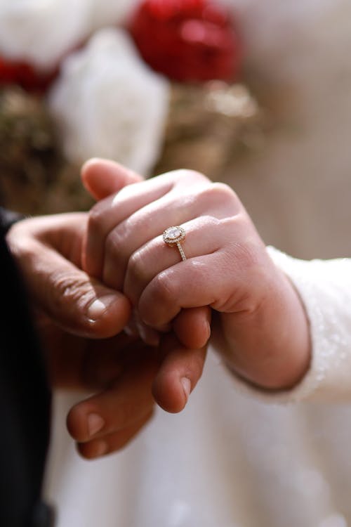 Hands of Newlyweds Together