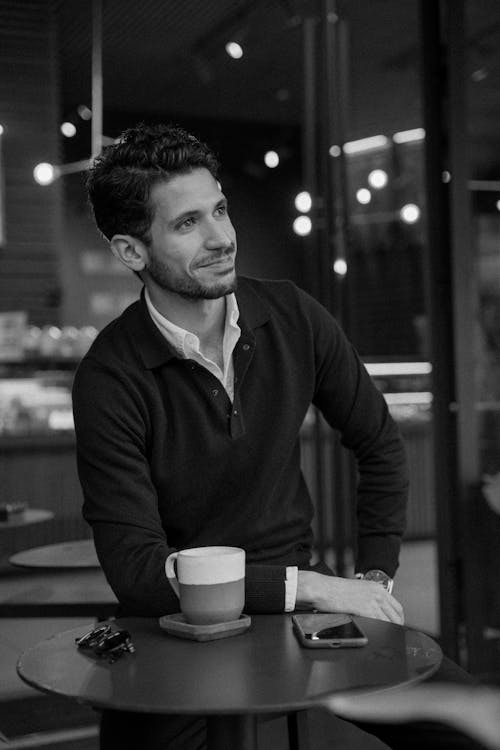 Man at Cafe in Black and White