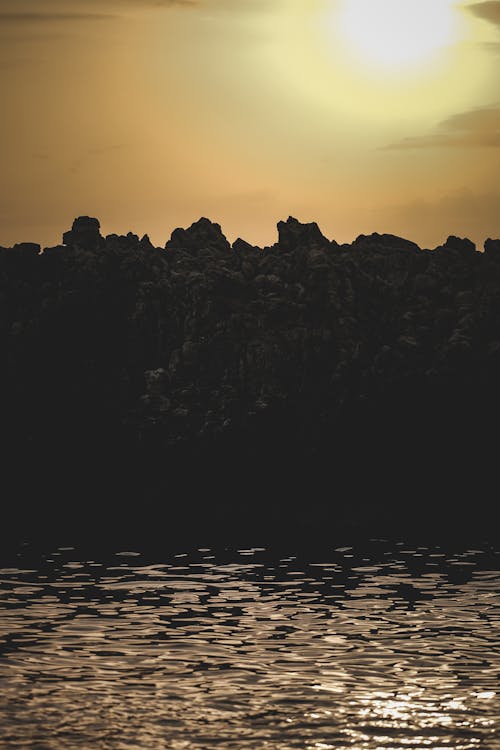 Foto stok gratis jurang, laut, matahari