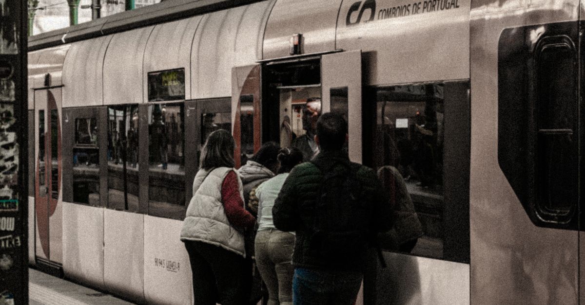 Getting Train People Getting on a Train at the Railway Station · Free Stock Photo