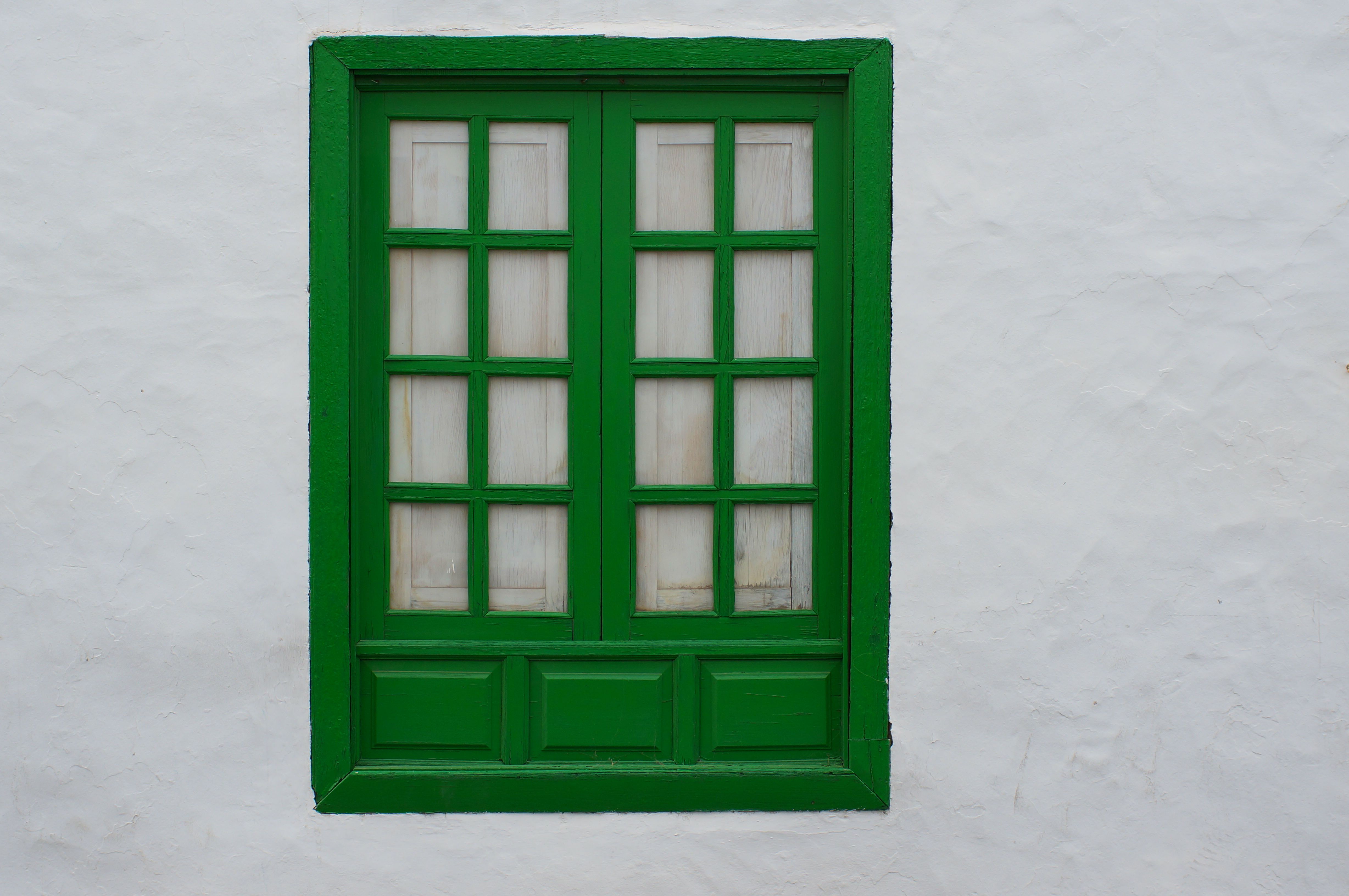 Green Wooden Window of a White Building · Free Stock Photo