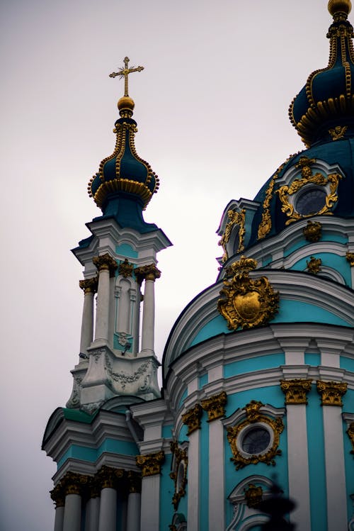 A close up of a blue and gold church