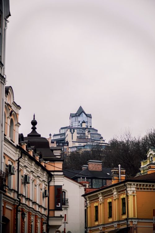 Free Charming view of urban skyline framed by historic old town architecture, showcasing diverse building styles. Stock Photo