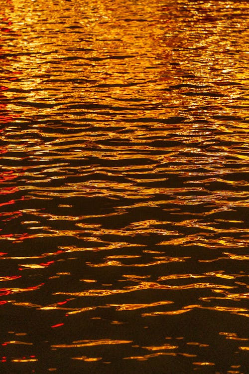 A reflection of the sunset on the water