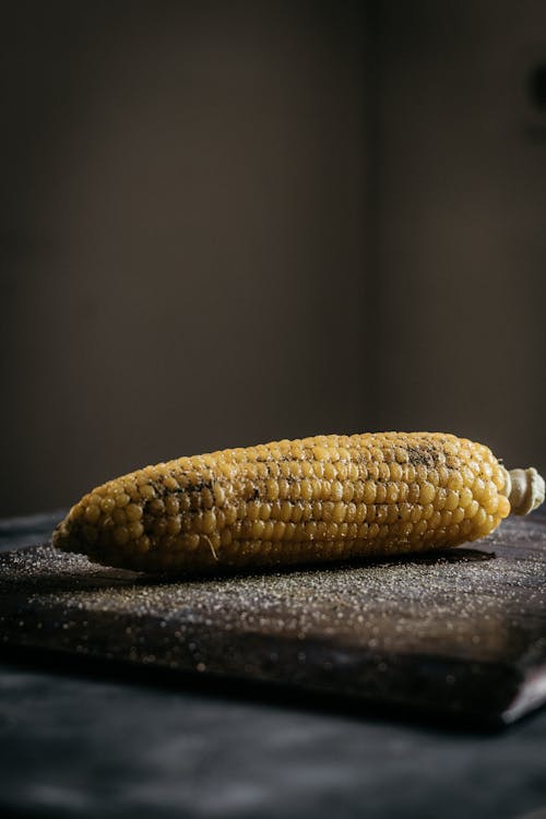 Free Corn on Brown Chopping Board Stock Photo