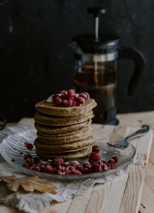 Stack of Pancakes With Red Berries