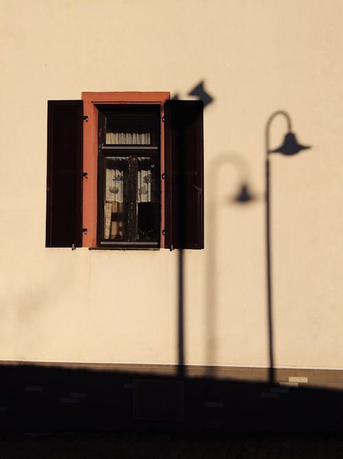 Darmowe zdjęcie z galerii z cień, lampa uliczna, migawki