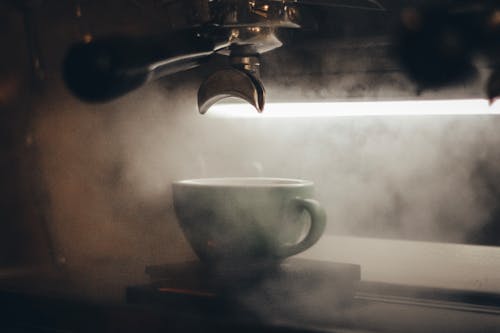 Free Cup on Espresso Maker Stock Photo