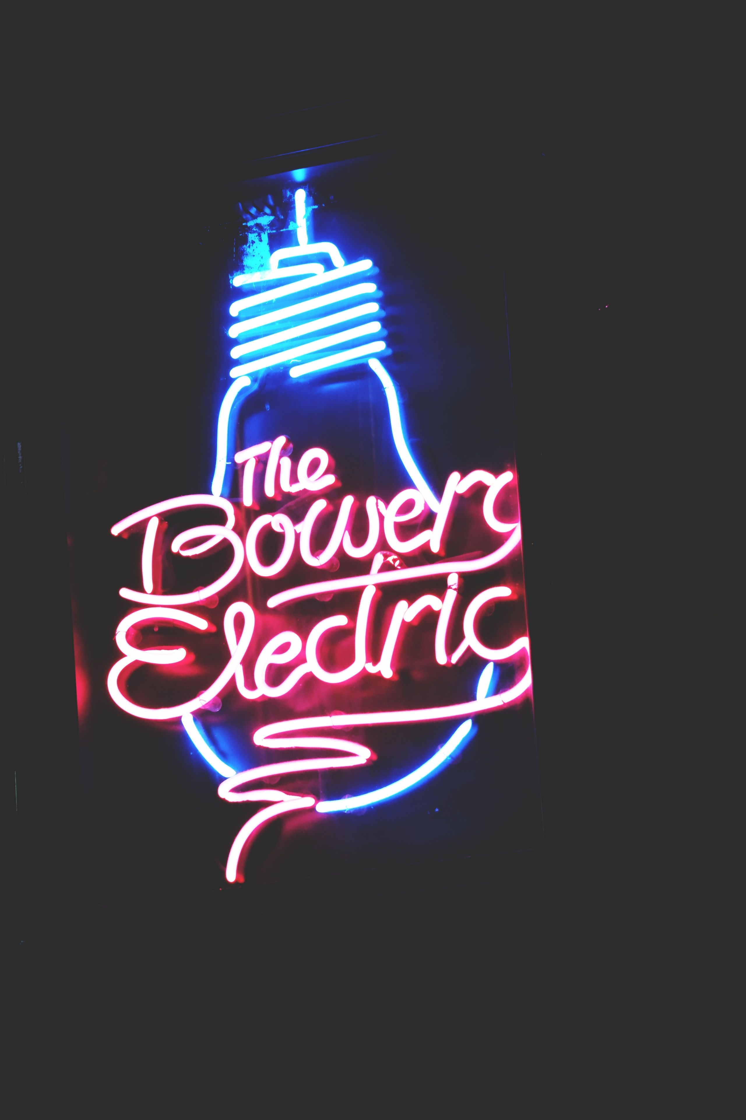 Neon Logo at Night · Free Stock Photo