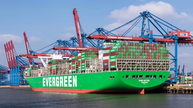 Evergreen container ship moored at Burchardkai Terminal, Hamburg harbor, Germany.