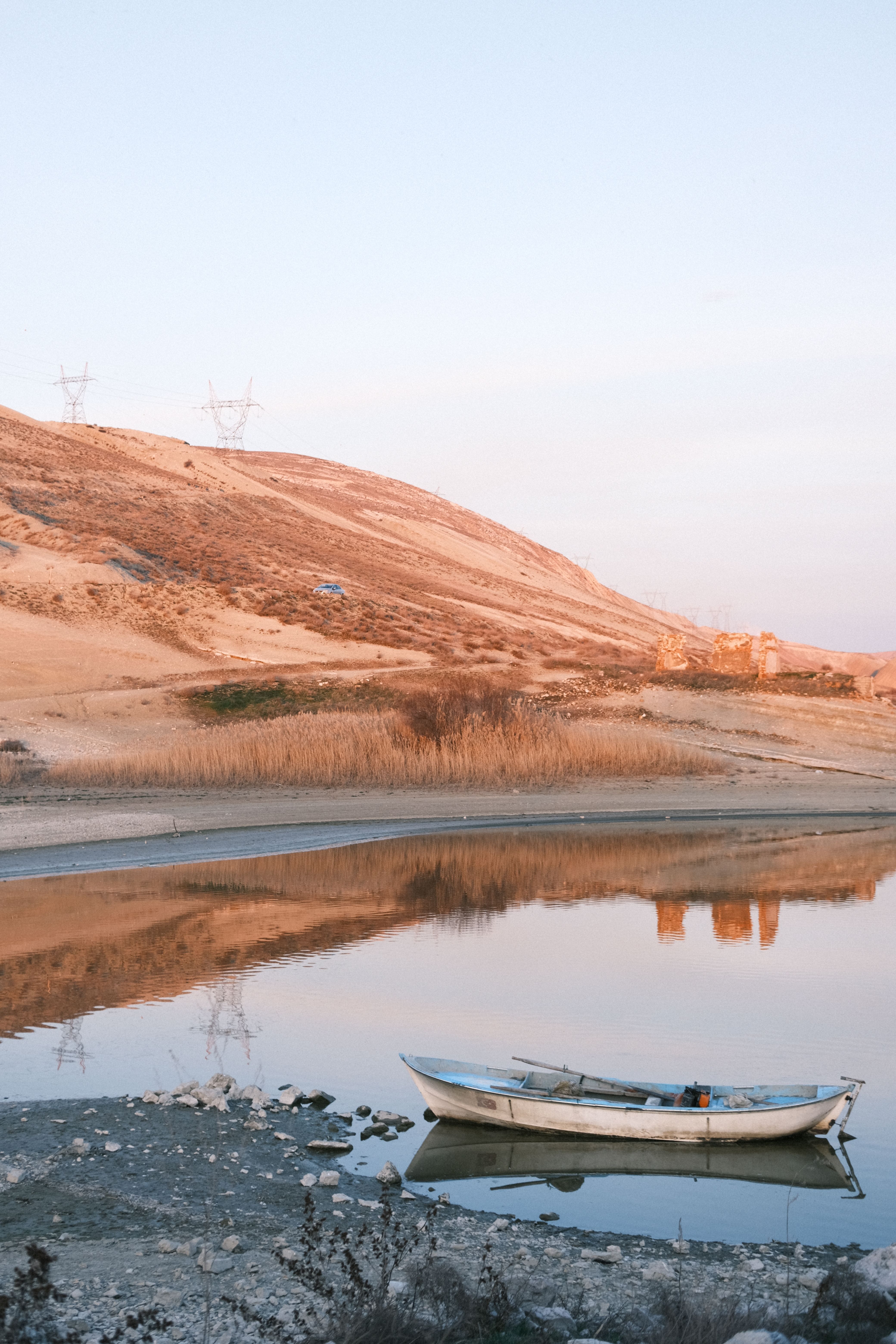 View of a Boat Moored on the Shore of a Body of Water · Free Stock Photo