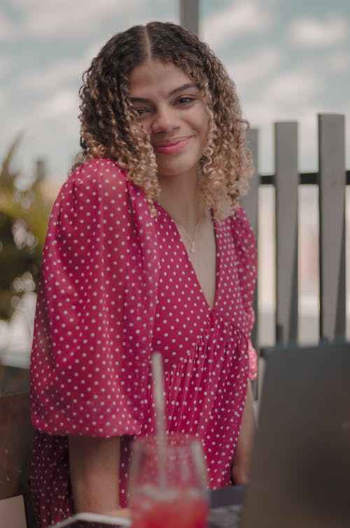 Portrait of Woman Wearing Pink Dotted Dress 