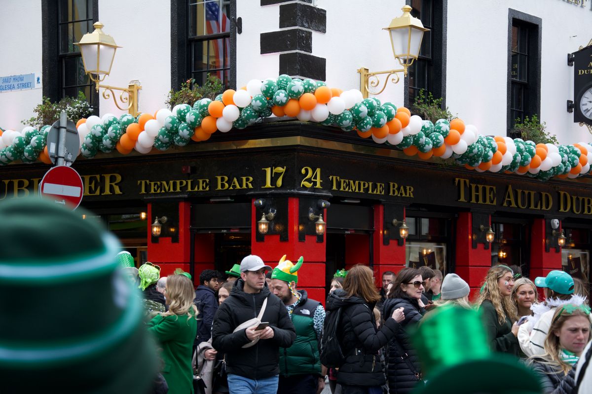 Dublin's Temple Bar during St. Patrick's Day — Ireland's pub culture is a genuine social institution, not a performance.