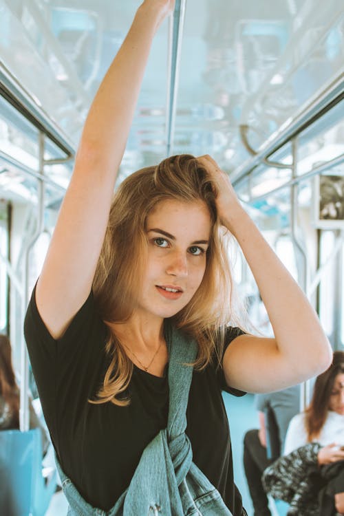 Shallow Focus Photo of Woman in Black T-shirt