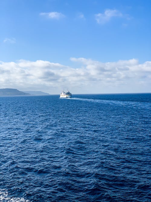 A cruise ship sailing across the ocean