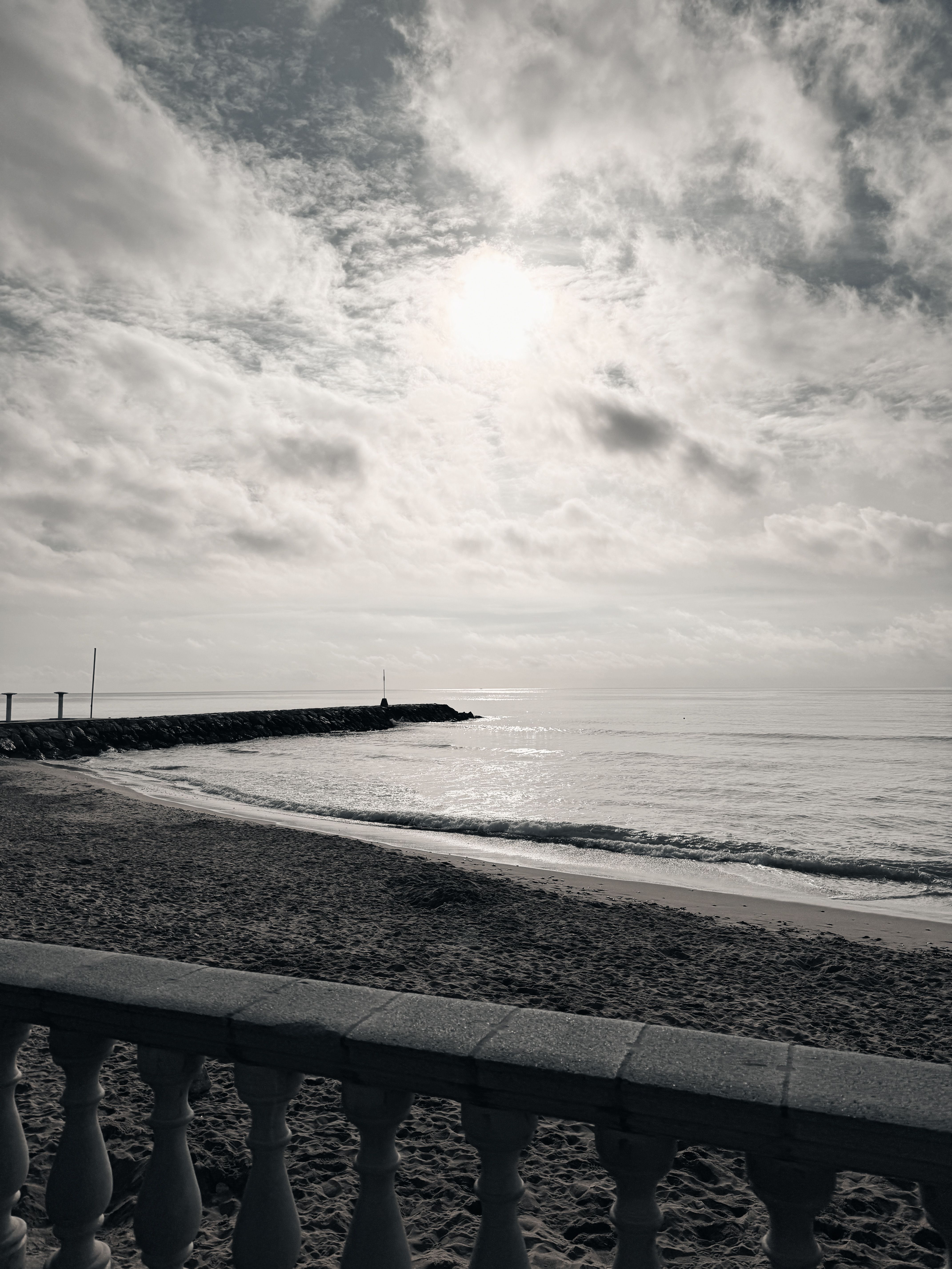 Railing and Breakwater on Sea Coast · Free Stock Photo