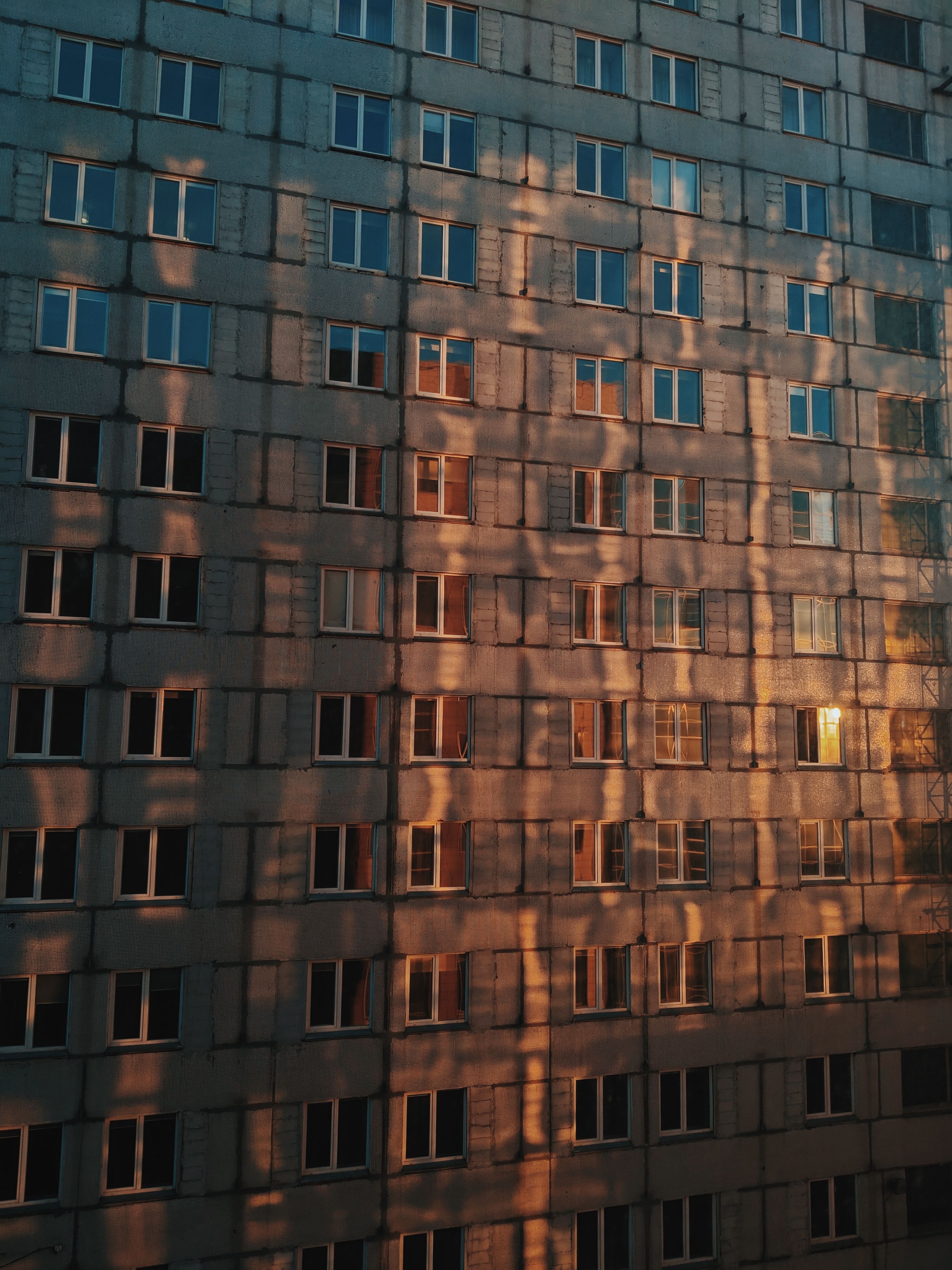 Windows in a House Building During Sunset · Free Stock Photo