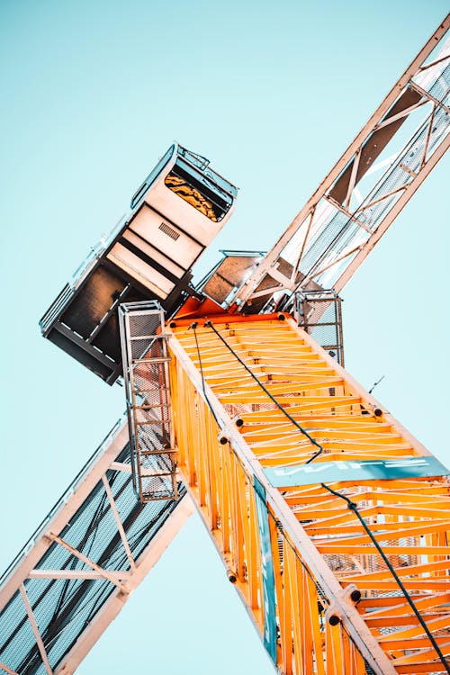 Free Low Angle Photography of Tower Crane Stock Photo