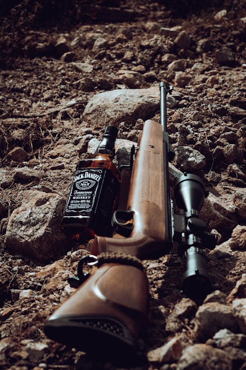 Free stock photo of alcohol, alcohol bottle, gun