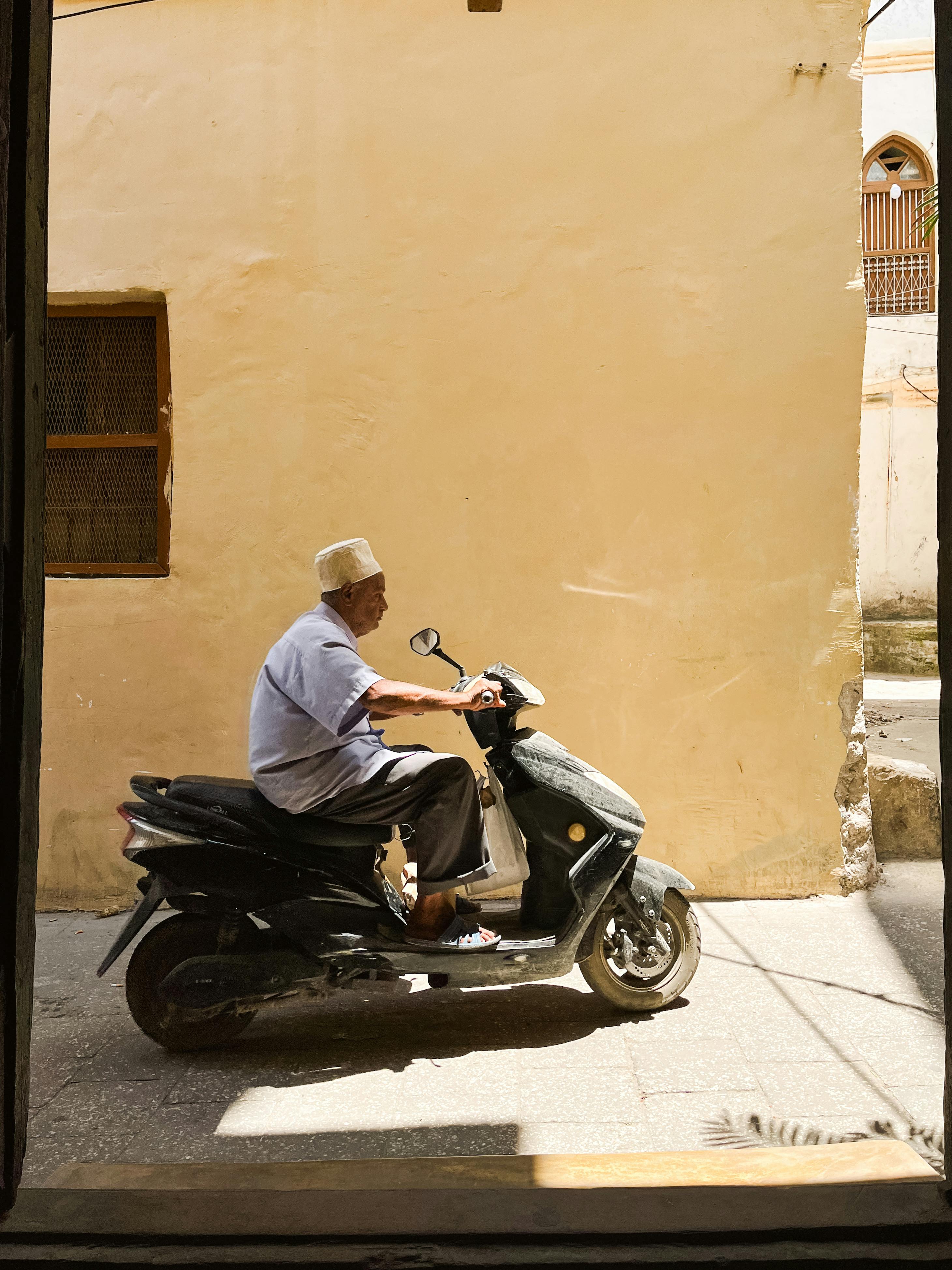 Person on mobility scooter outdoors