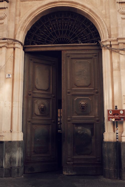 Free Explore the intricate details of a gothic architectural doorway in Catania, Sicily. Stock Photo
