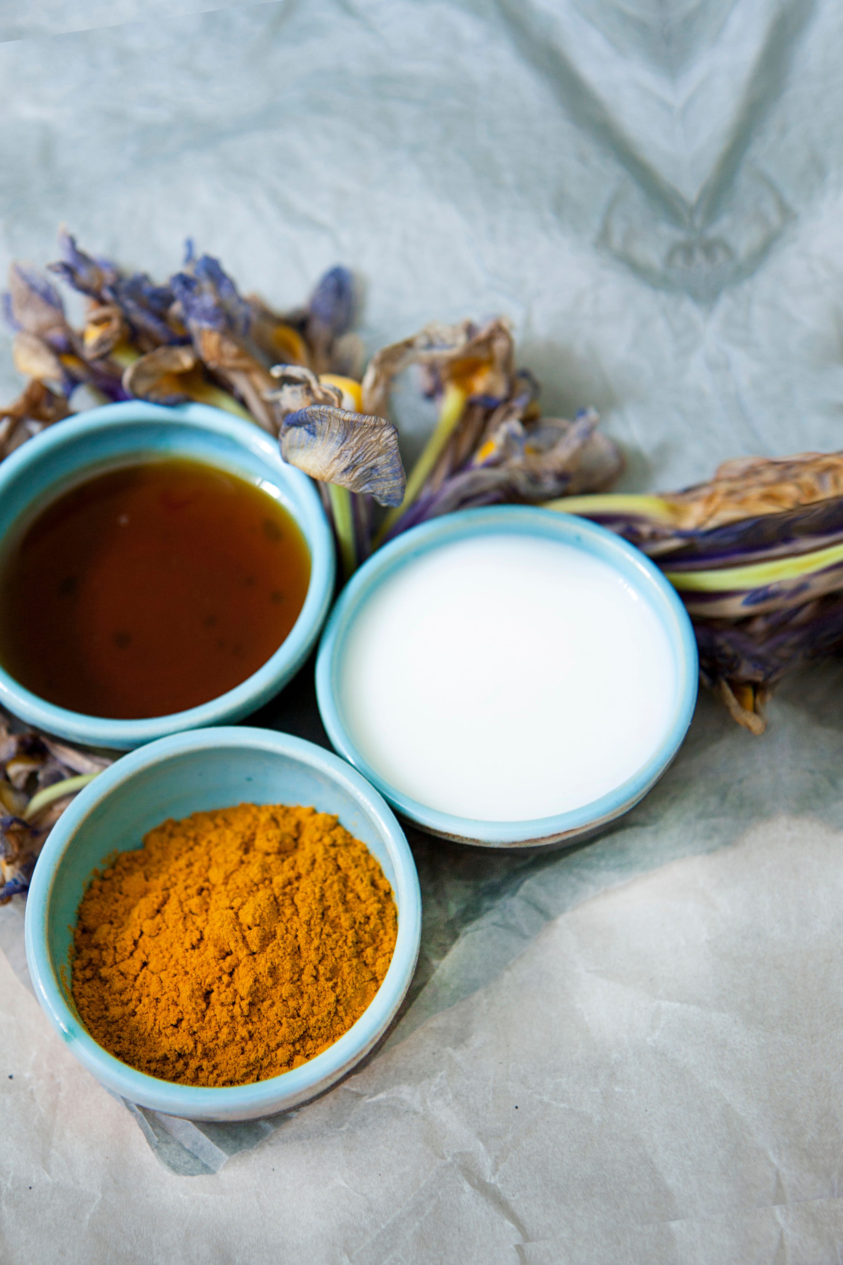 Natural skincare ingredients — turmeric, rose, and botanicals