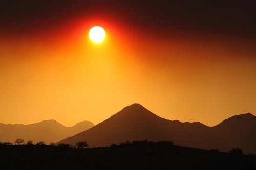 Silhouette Photography of Mountains and Trees