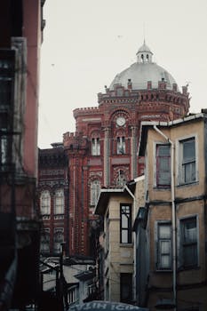Dramatic view of the historic Phanar Greek Orthodox College with red brick facade in İstanbul, Türkiye.