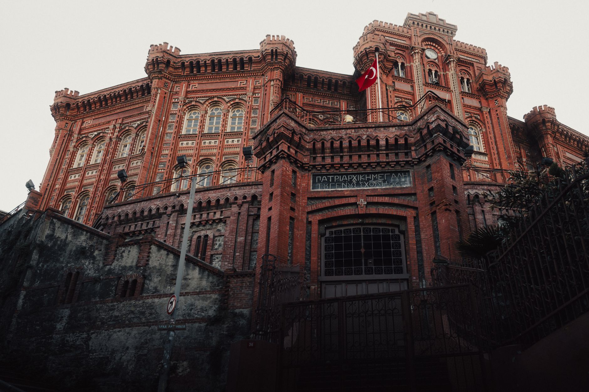 Historic red brick architecture of the Phanar Greek Orthodox College in Istanbul, Türkiye.
