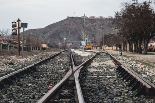 Free Autumn view of railway tracks leading to mountains in Palu, Elazığ, Türkiye, showcasing transportation and landscape beauty. Stock Photo