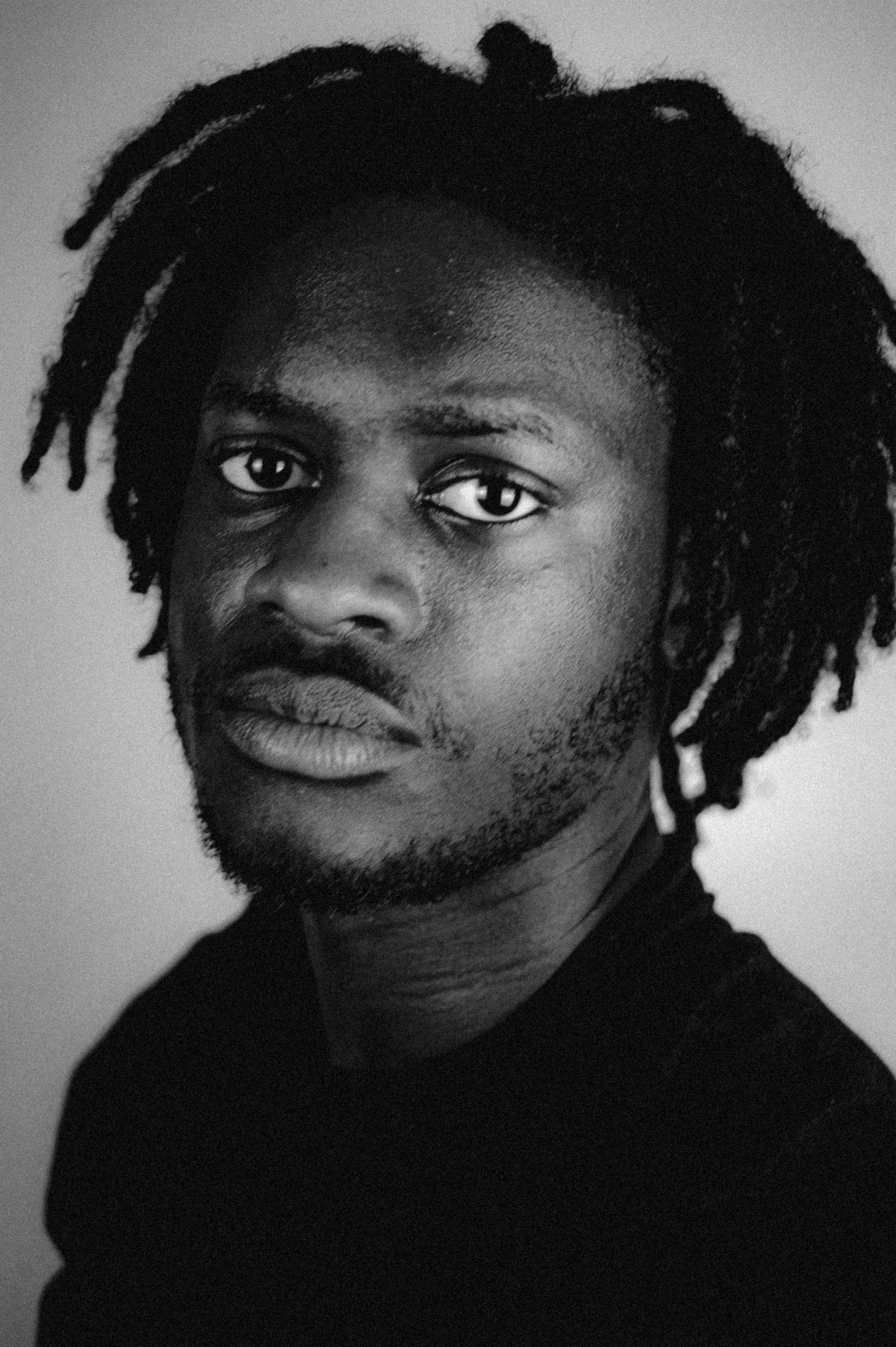 Portrait of a Man with Dreadlocks · Free Stock Photo