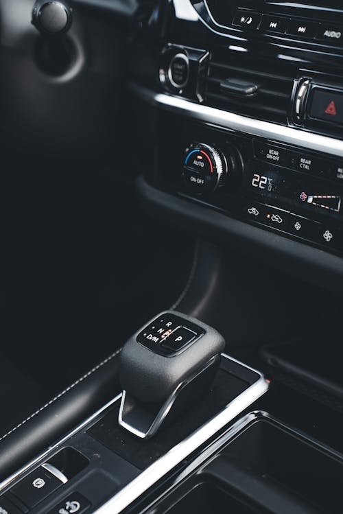 A close up of the gear shift in a car