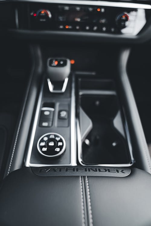A close up of the gear shift in a car