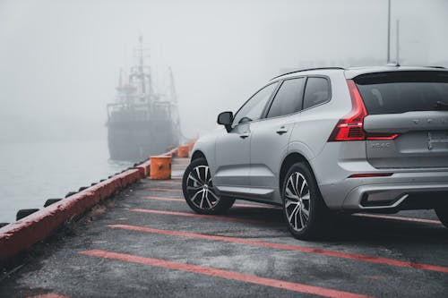 Car Parked in Harbor in Mist