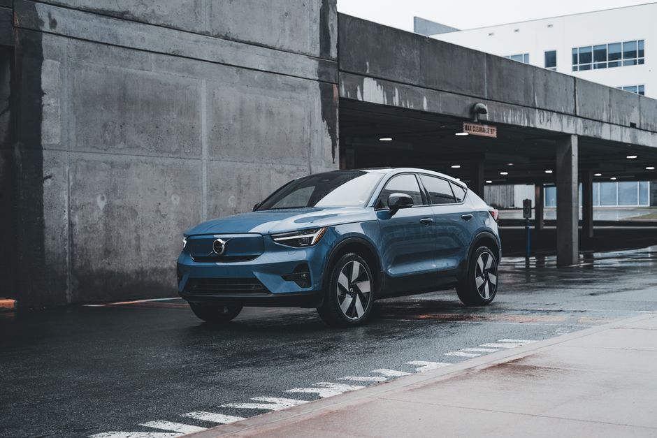Volvo EX60 midsize electric SUV front three-quarter studio