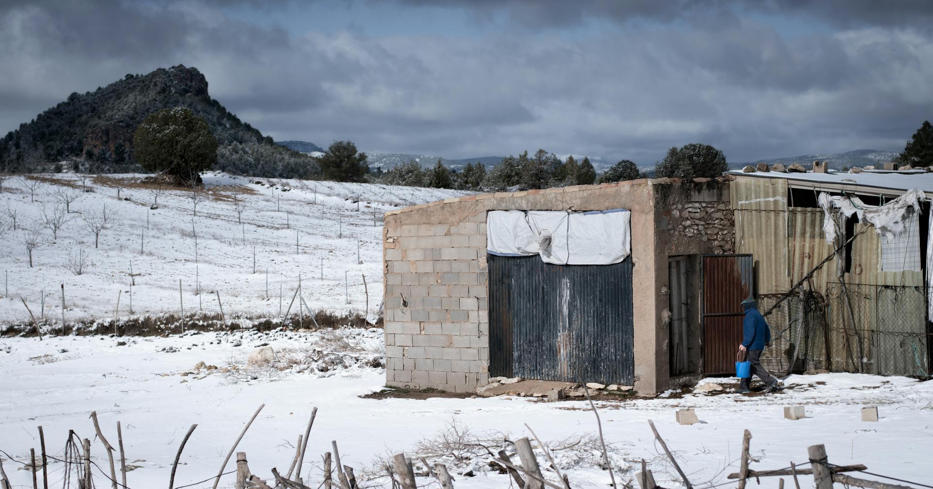 Person Walking into an Abandoned Home