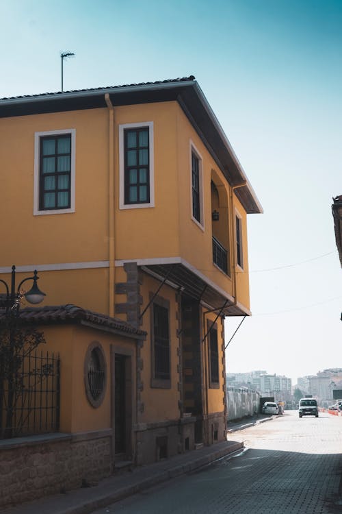 Foto profissional grátis de amarelo, casa, casas