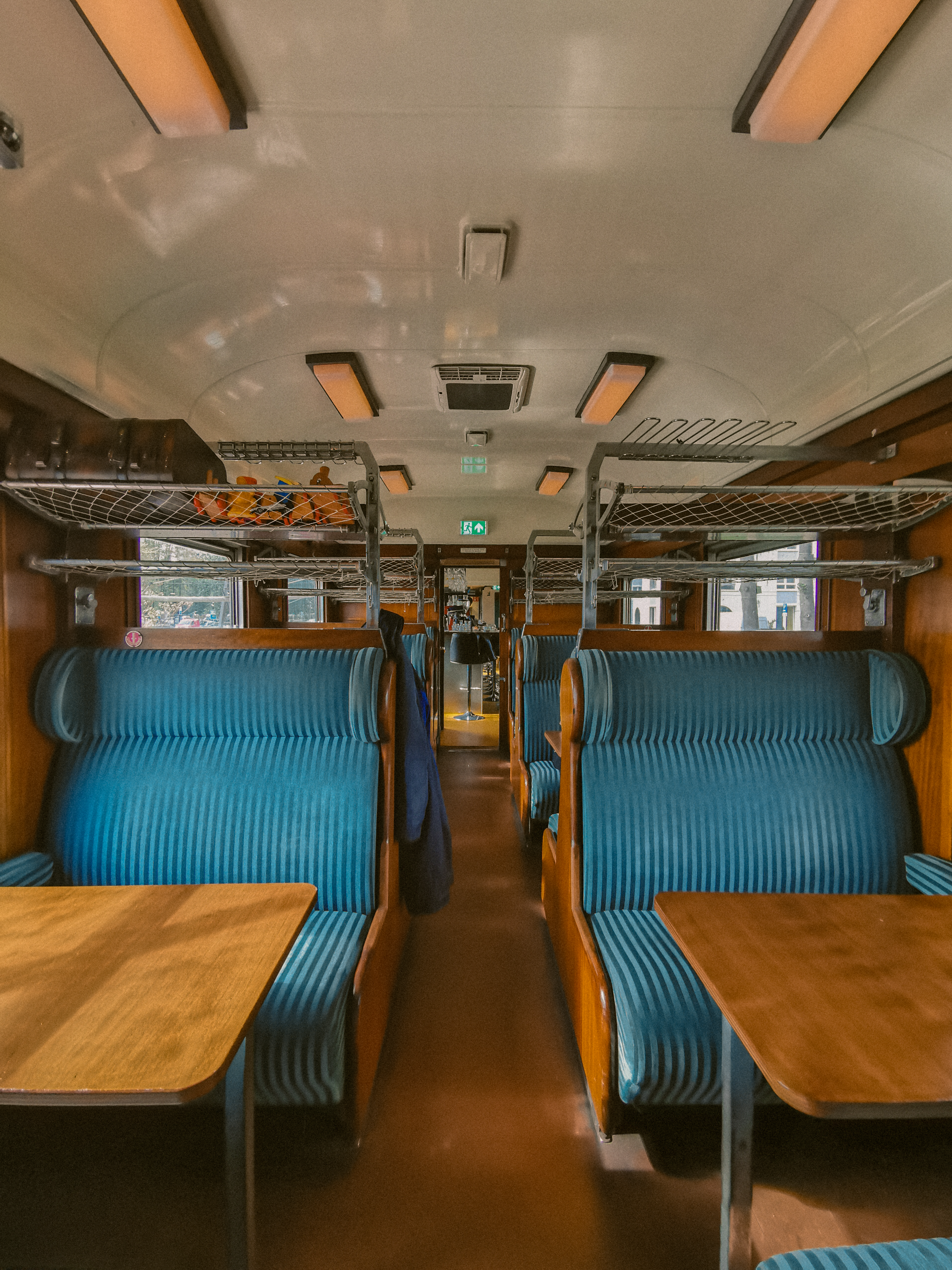 Soft Armchairs with Tables in Train · Free Stock Photo