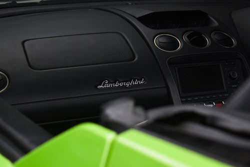 closeup view of the dashboard in the passenger side of a Lamborghini Gallardo 