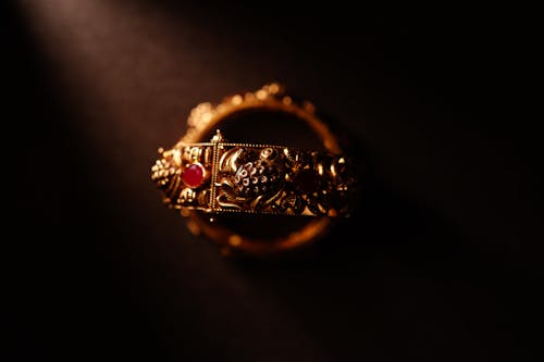 Gold bangle with top angle photo