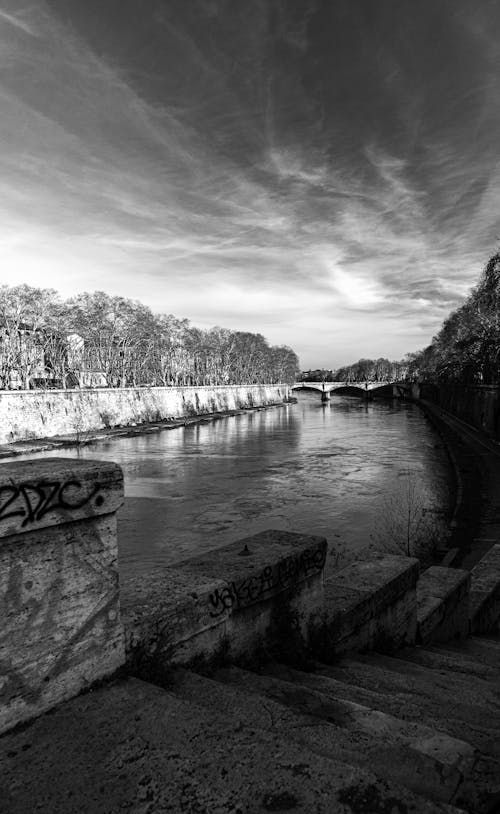 A black and white photo of a river