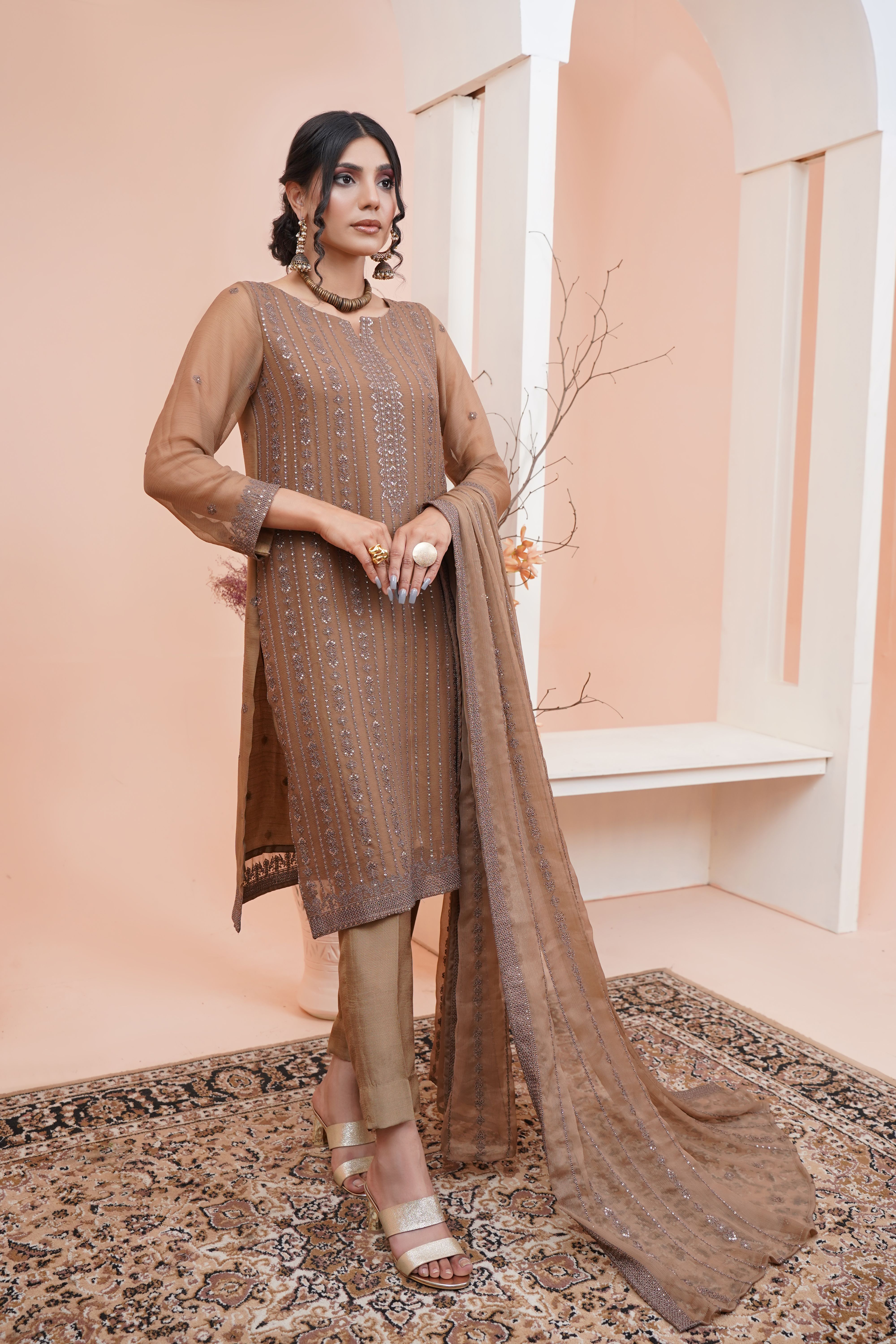 Brunette Woman Standing in Brown Dress with Shawl  Free Stock Photo