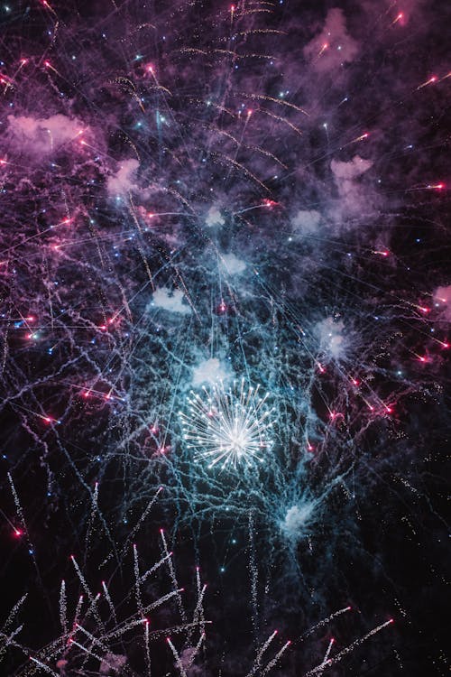 Fireworks in the sky with pink and blue colors