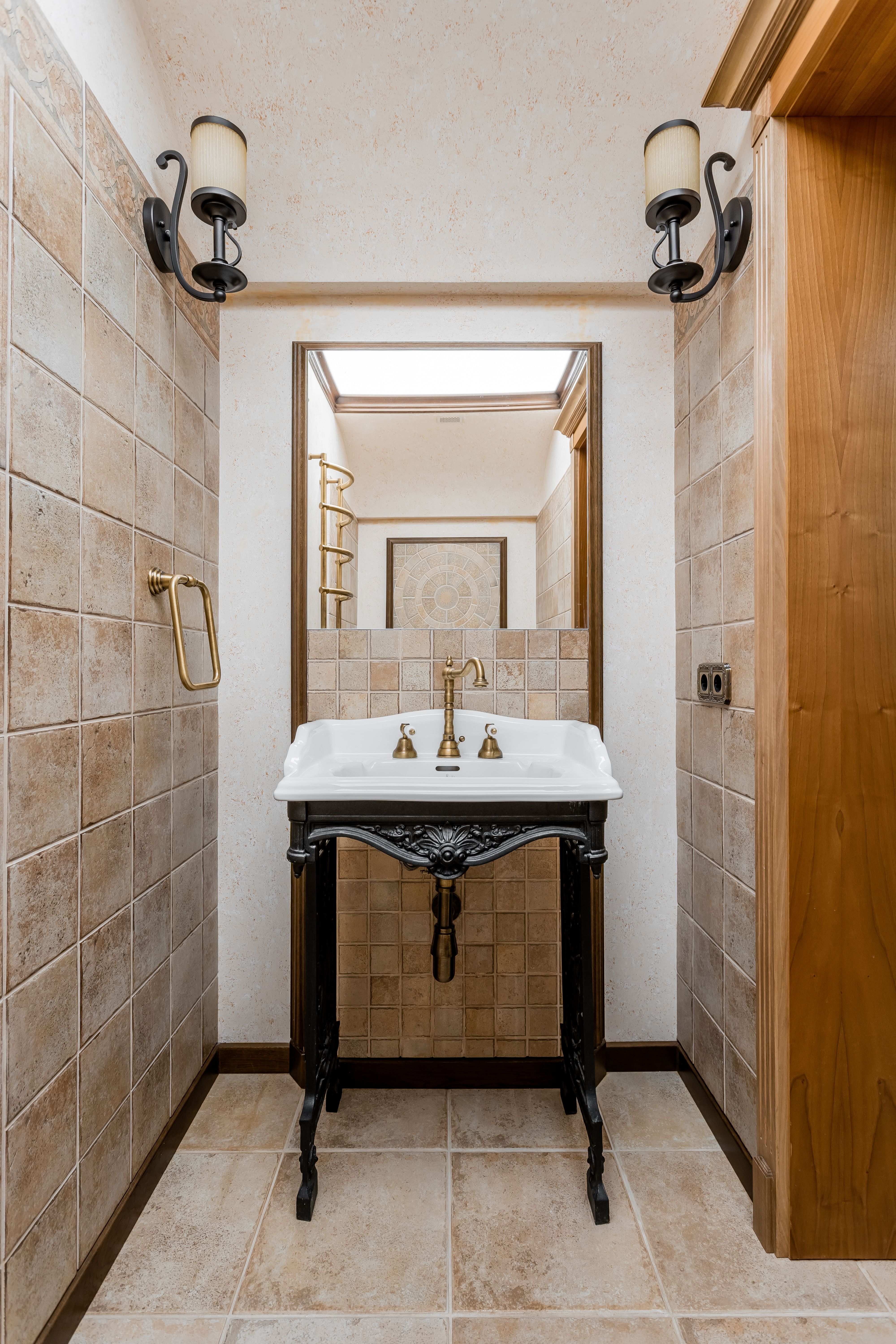 Original mid-century bathroom with vintage washbasin before renovation
